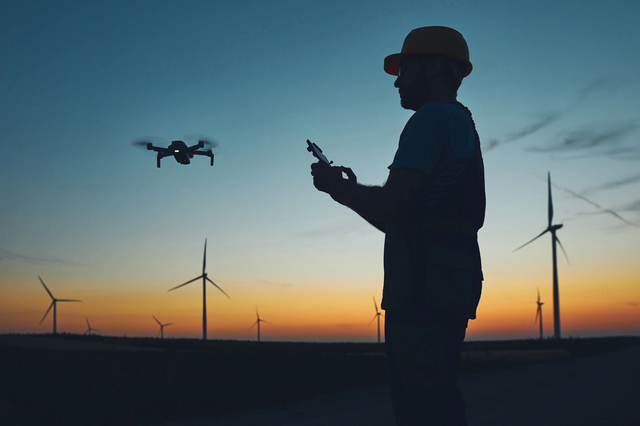 Engineer mechanic using drone for inspection in a